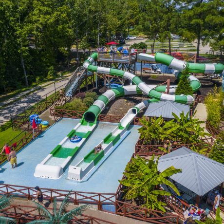 Best waterpark and waterslides - Pirates Bay Waterpark in Leesburg AL (Northern Alabama), a sprawling aquatic playground located on a hilltop overlooking Weiss Lake. There’s fun for everyone with tube slides, body slides, multiple pools, waterfalls, splash playground, food, drinks, parties, and so much more!